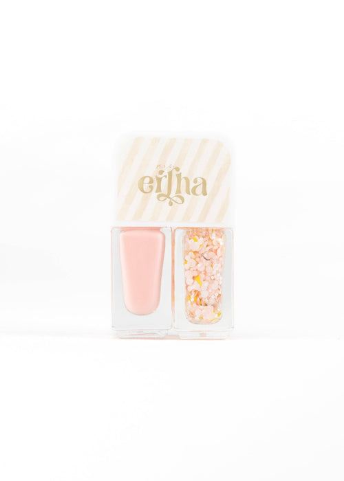 A nail kit by Ertha containing a soft pink nail polish bottle and a clear compartment filled with pastel pink, yellow, and orange glitter flakes, set against a plain white background.