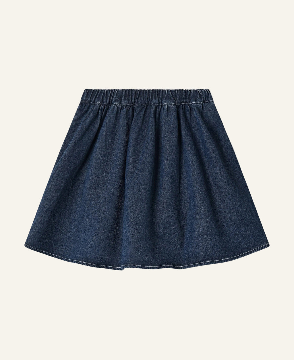 A dark blue denim A-line skirt with an elastic waistband, shown flat against a light cream background.