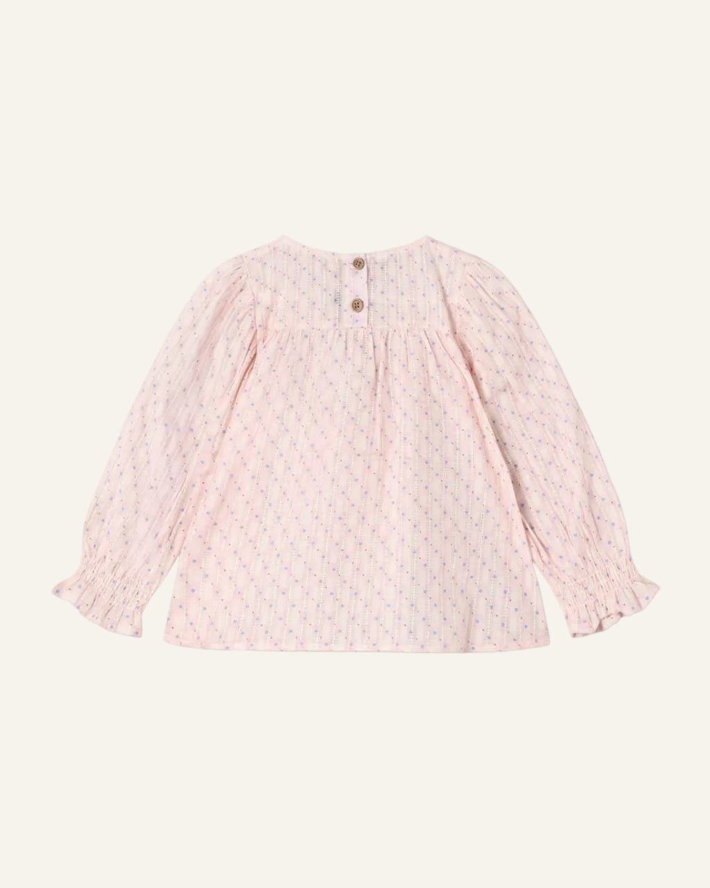 Pink textured long-sleeve top on a light gray background