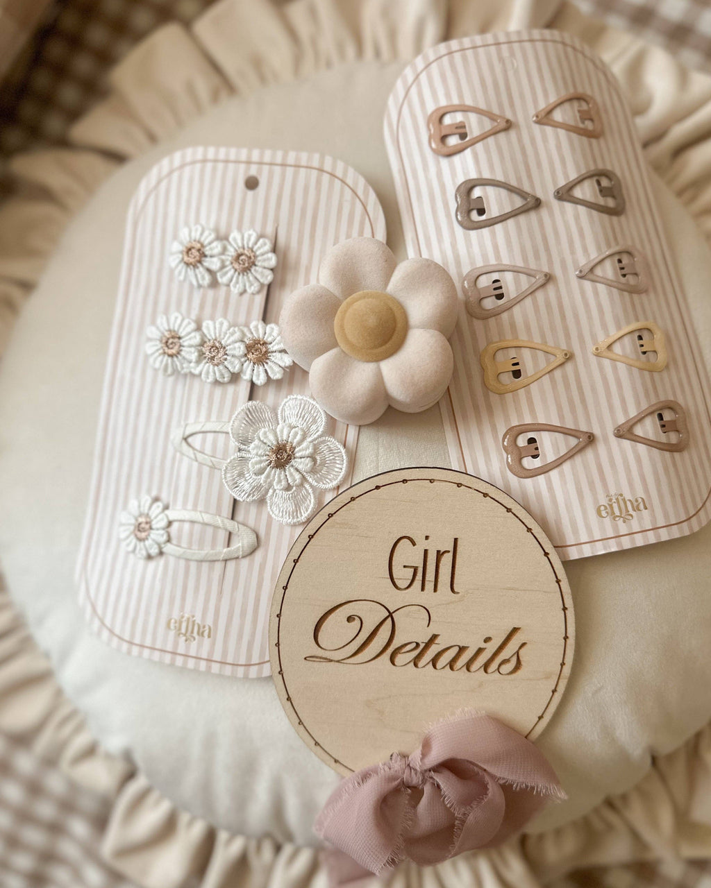 Phone cases with decorative elements and a 'Girl Details' label on a textured surface.