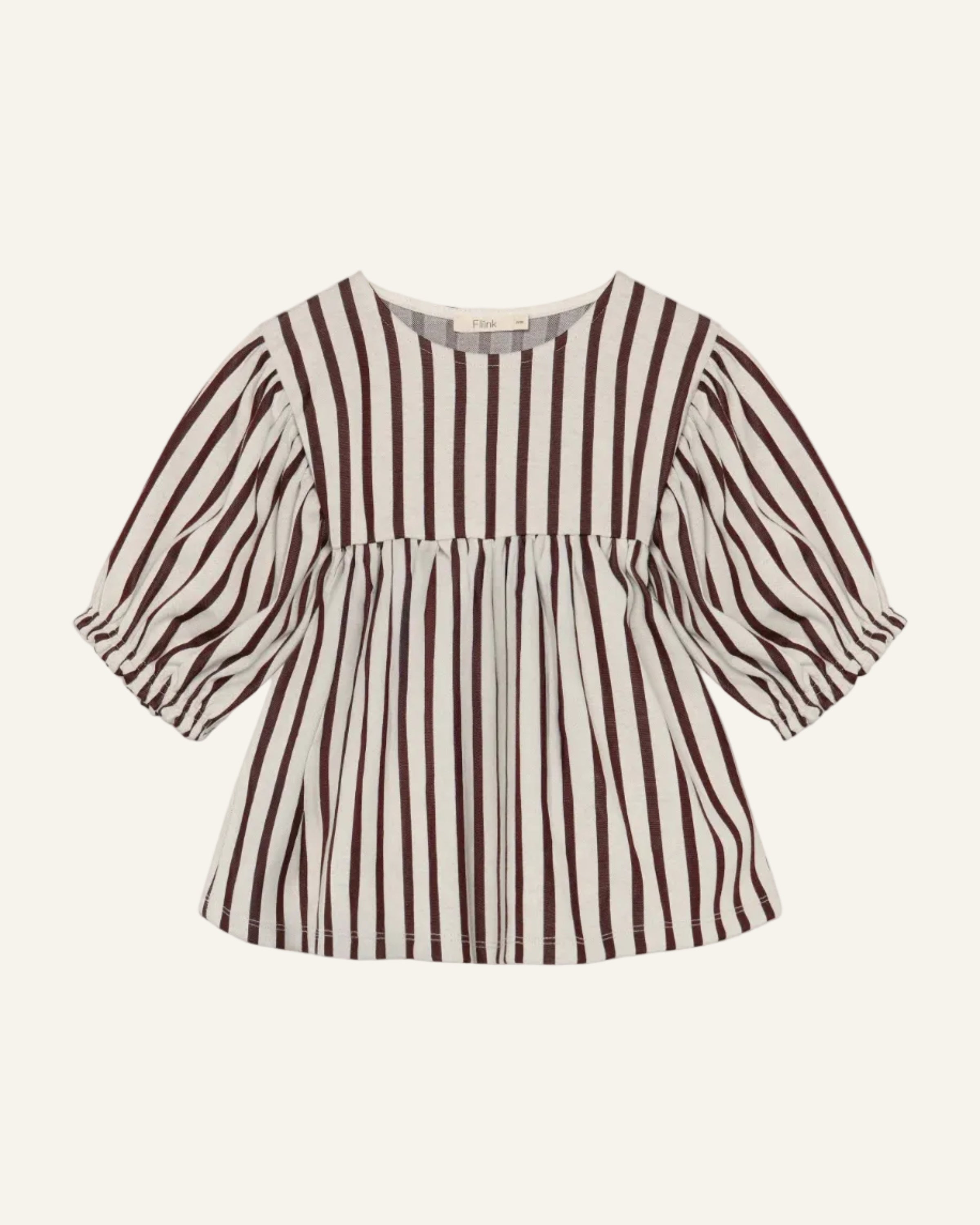 A children's top with vertical brown and cream stripes, featuring a smocked bodice and puff sleeves, shown flat on a light gray background.