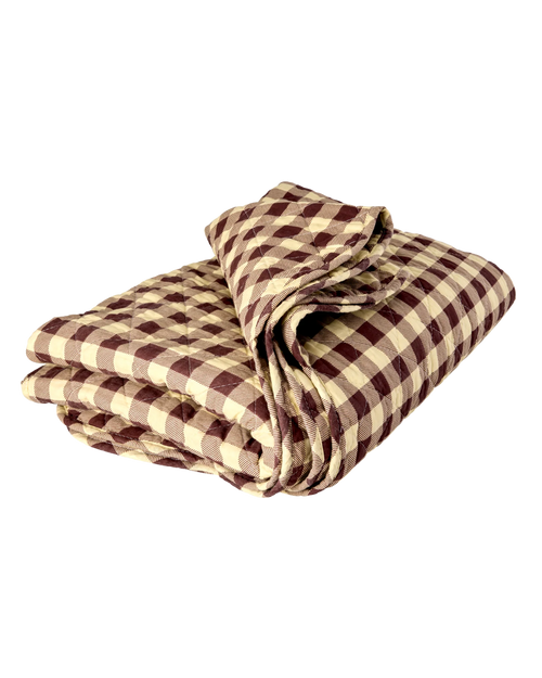 A folded quilted blanket with a brown and beige gingham checkered pattern, isolated on a white background.