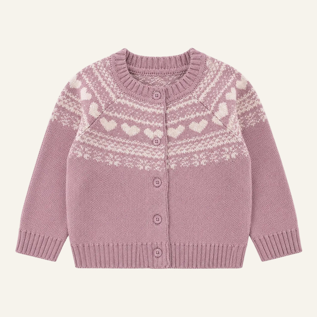 A pink knit cardigan sweater with a cream-colored Fair Isle pattern featuring hearts and snowflakes, displayed on a clean white background.