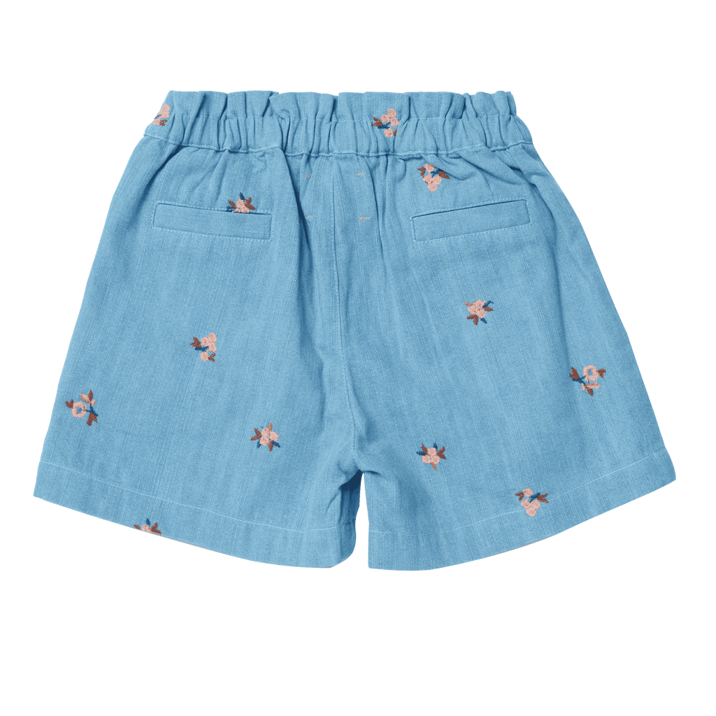 Blue shorts with floral patterns on a black background