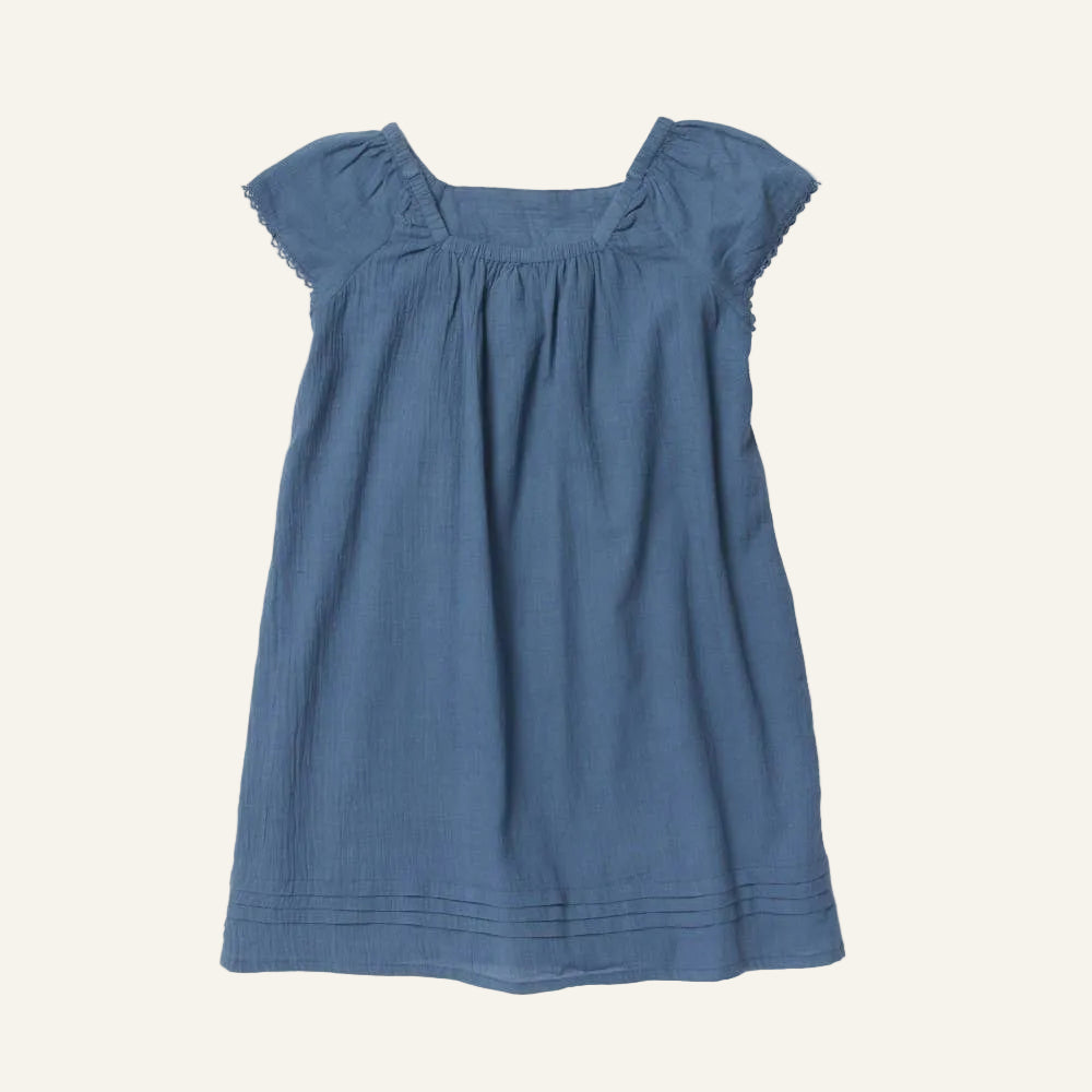 Blue dress with ruffled shoulders on a white background