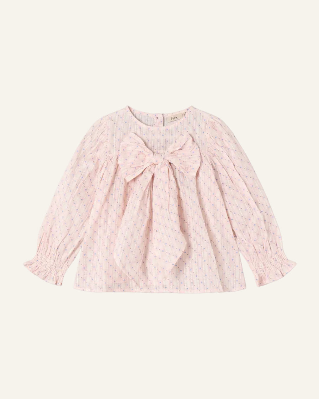 Pink blouse with a large bow on a light gray background