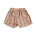 Floral patterned shorts on a white background