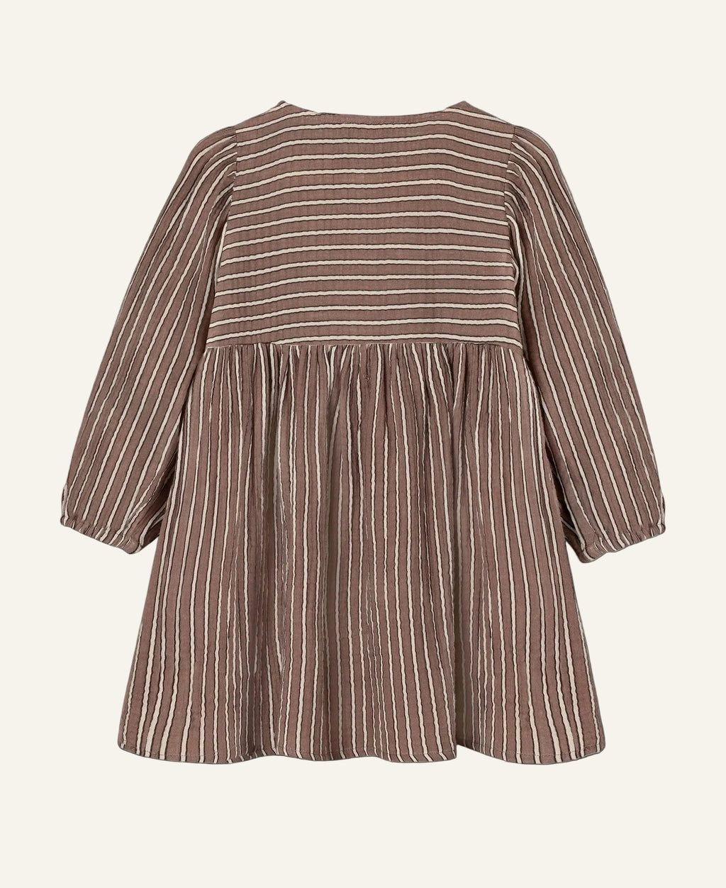 A brown and beige vertically striped long-sleeve dress shown from the back, featuring a gathered waist seam and a flared skirt, set against a plain light gray background.