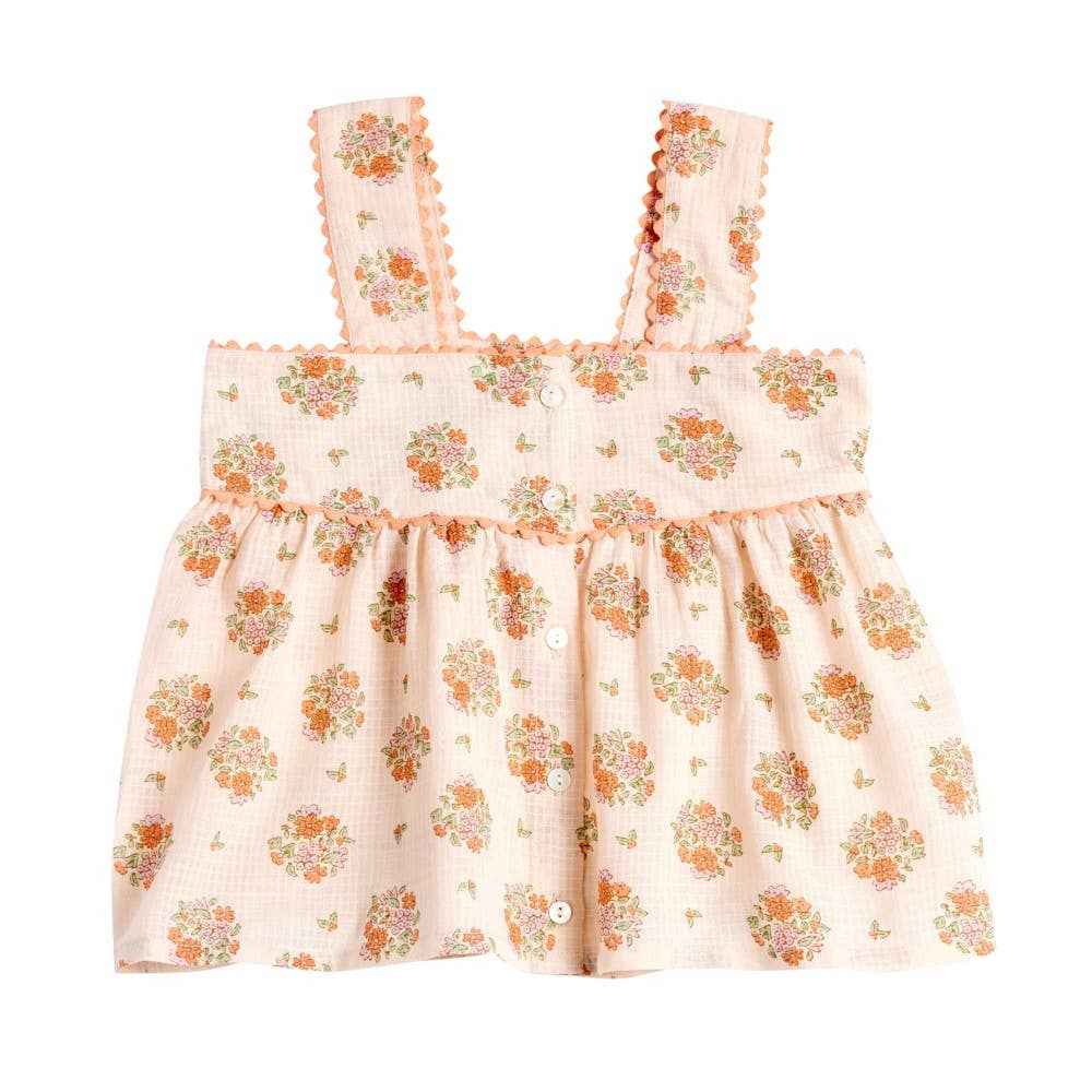 Floral dress with ruffled straps on a white background