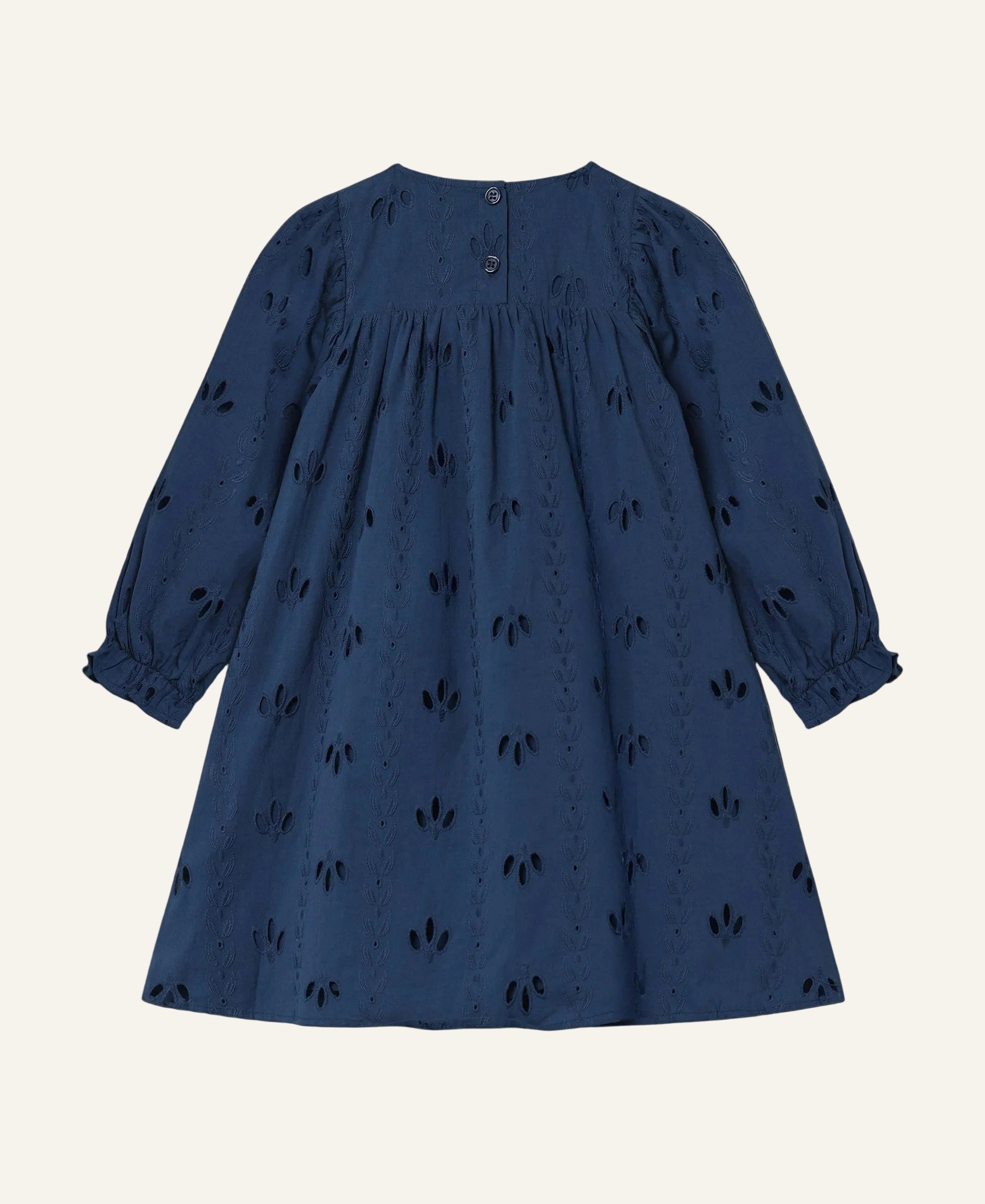 Navy blue dress with subtle pattern on a light gray background