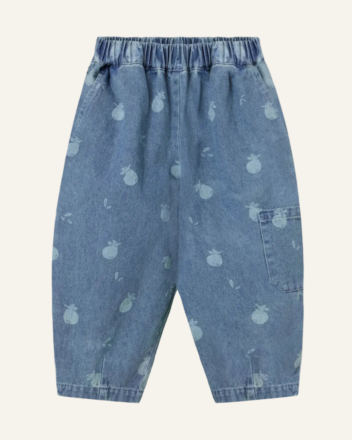 Blue denim pants with pear pattern on a light blue background