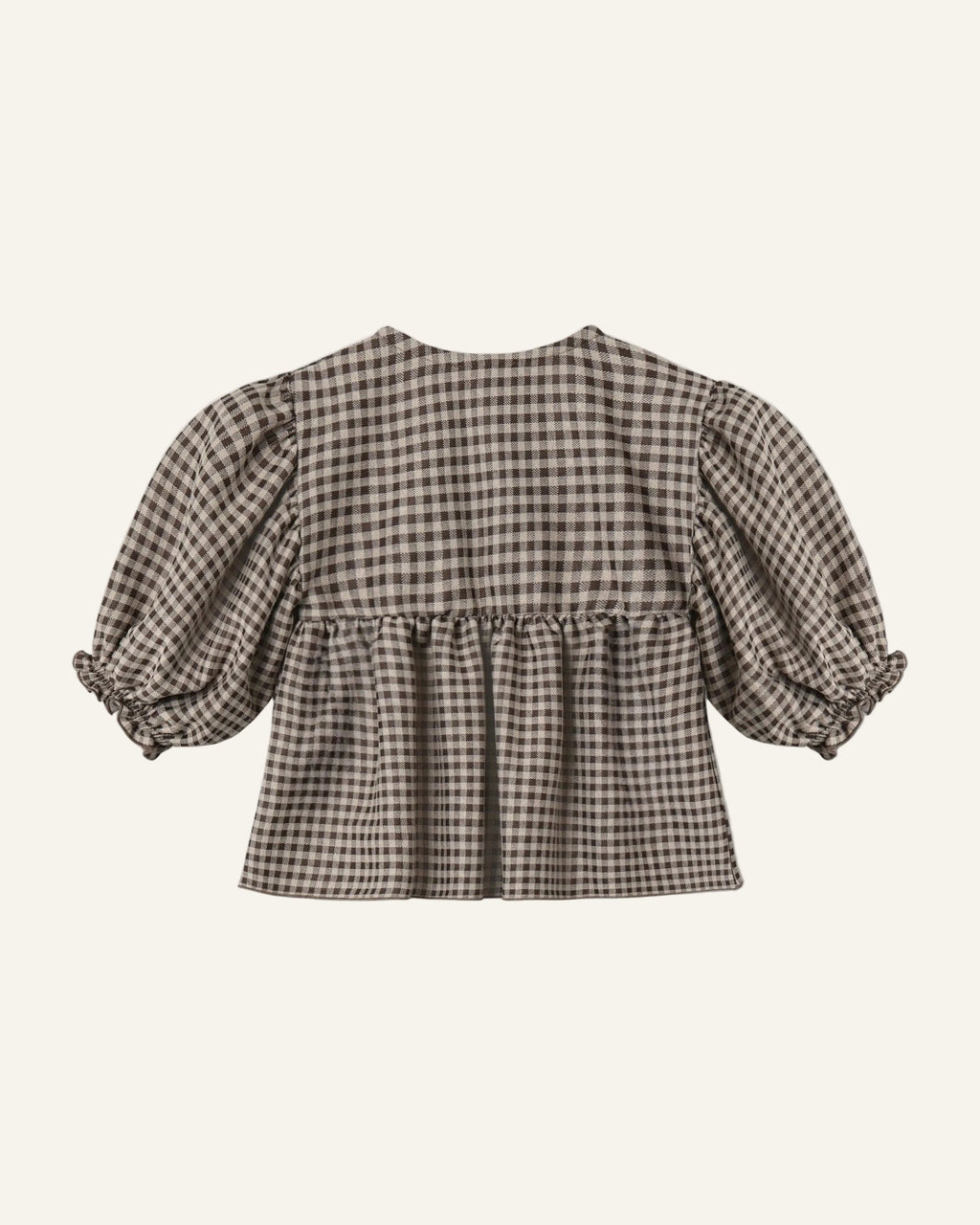 A cropped blouse with a brown and beige gingham pattern, featuring voluminous puff sleeves with ruffled cuffs and a gathered waist seam, shown from the back on a light gray background.